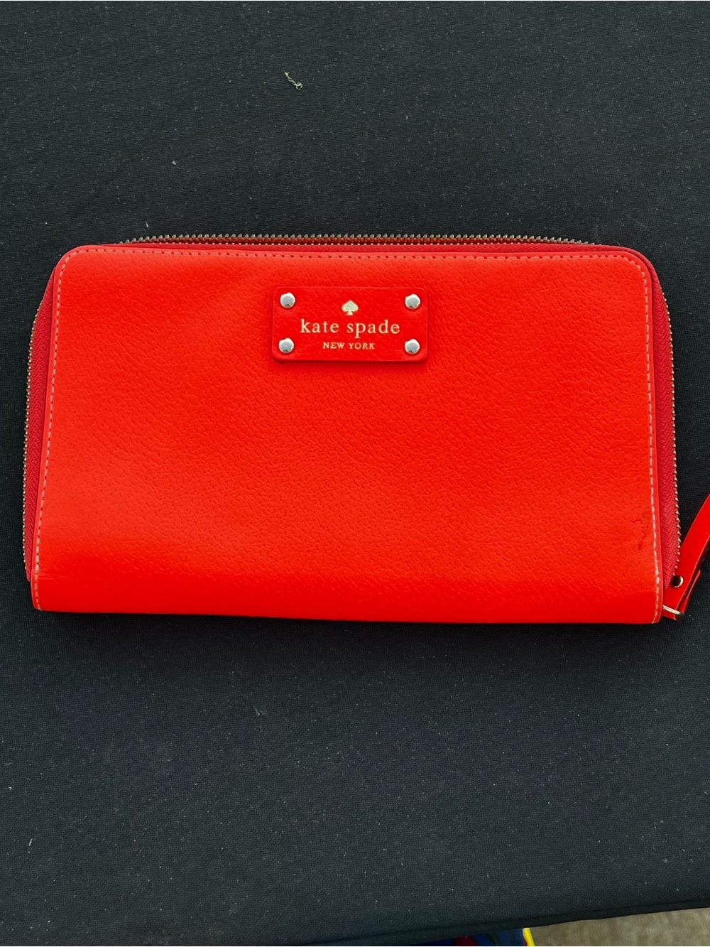 kate spade red zip-around leather wallet